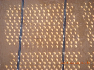 49 999. Makassar Straight total solar eclipse - cresent shaped shadows