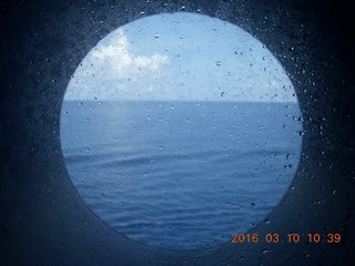 4 99a. Volendam at sea - porthole view