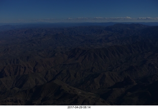 darkened aerial photo of mountains