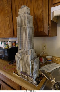 my cardboard Empire State  Building trashed by my cat Max