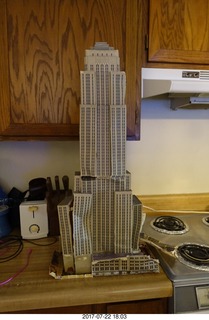 my cardboard Empire State  Building trashed by my cat Max