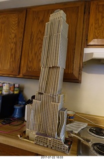 my cardboard Empire State  Building trashed by my cat Max