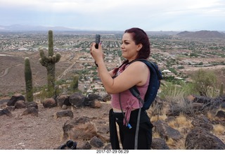 Elba taking a picture atop Thunderbird Mountain