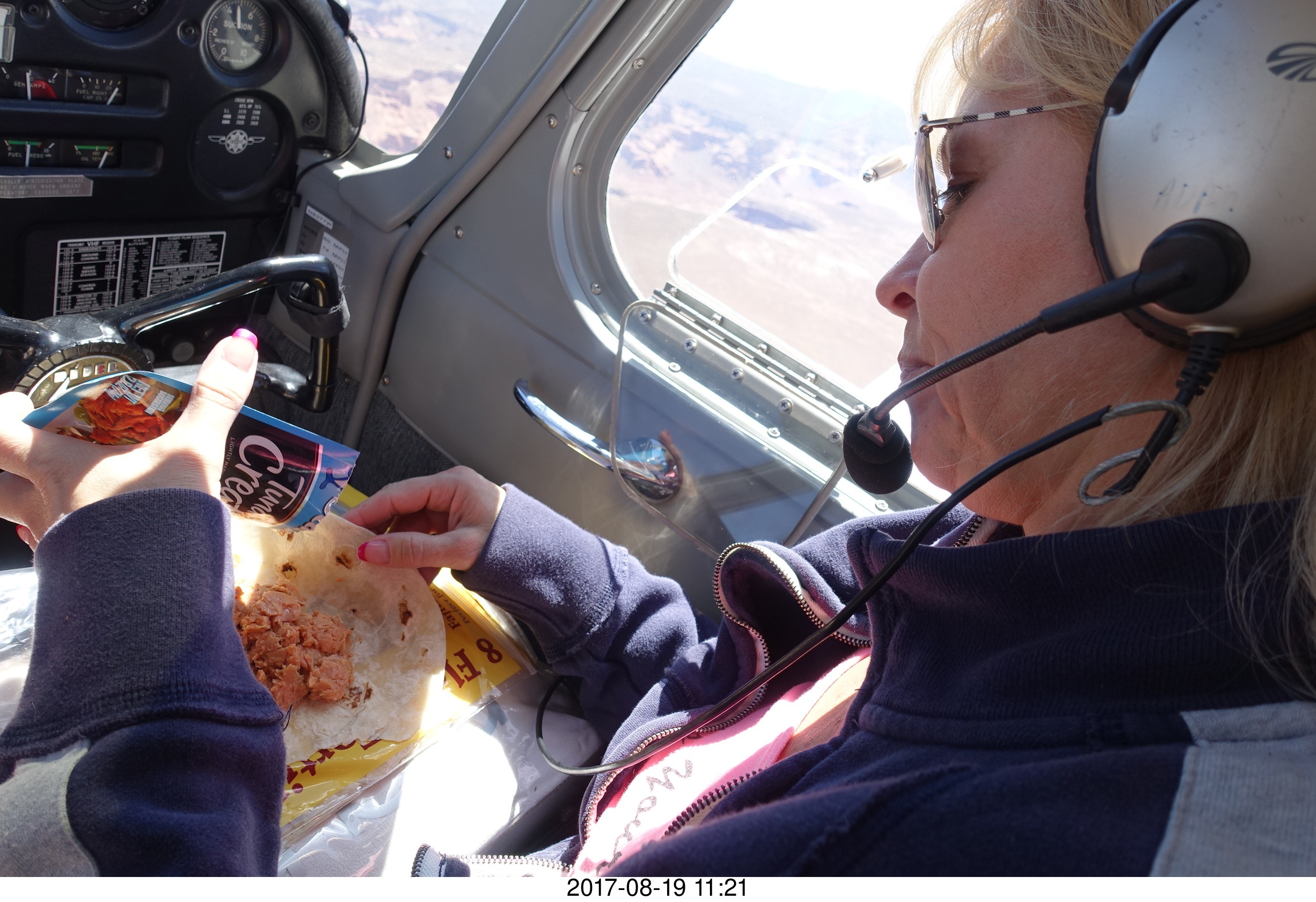 Kim preparing her in-flight meal