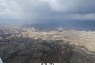 211 9sk. aerial - Book Cliffs - Desolation Canyon - clouds and rain
