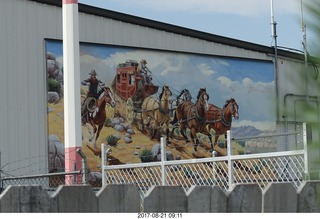 41 9sm. Riverton Airport - wagon train mural