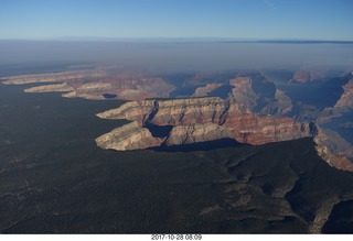 aerial - Grand Canyon with fires on the north rim