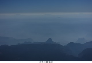 aerial - Grand Canyon with fires on the north rim