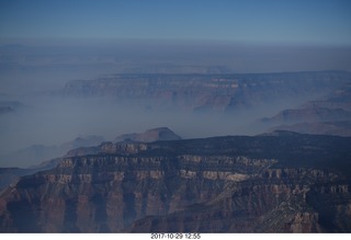 aerial - Grand Canyon with fires on the north rim