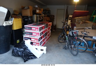 my garage - shelves in boxes, bicycles