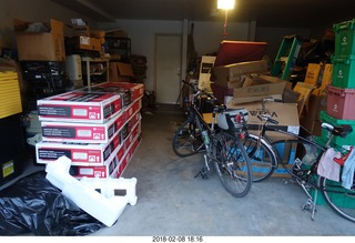 my garage - shelves in boxes, bicycles