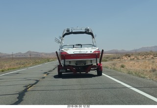 102 a02. drive from scottsdale to gateway canyon - following a big boat