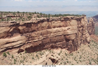 116 a03. Colorado National Monument - Book Cliffs in the distance (Little Book Cliffs, maybe Paperback Book Cliffs)