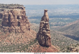 118 a03. Colorado National Monument - Book Cliffs in the distance (Little Book Cliffs, maybe Paperback Book Cliffs)