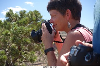 141 a03. Colorado National Monument + Karen taking a picture of a squirril