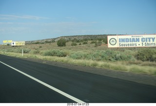 driving from gallup to petrified forest - signs for Indian City souvenir stands