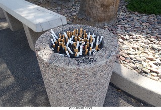 lots of cigarettes in the ashtray