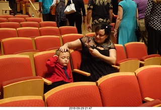 sleepy kid at orchestra concert