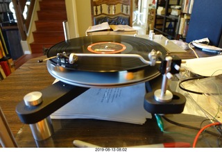 68 a0g. Trasncriptor Skeleton turntable and Vestigal tonearm playing a record