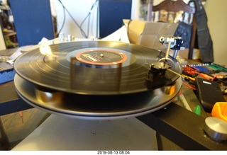 80 a0g. Trasncriptor Skeleton turntable and Vestigal tonearm playing a record