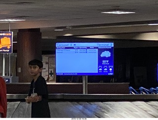 far-away picture of airport sign