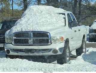 Flagstaff FLG parking lot - snowy truck
