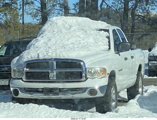 Flagstaff FLG parking lot - snowy truck