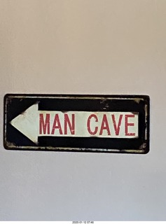 Flagstaff FLG Wiseman Aviation - MAN CAVE sign