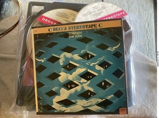 54 a0q. Tommy tape, the Who