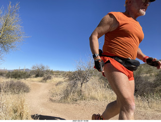 Adam shirtless atop North Mountain hike