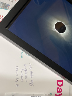 Andy Pagan framed eclipse picture settings at Walgreens