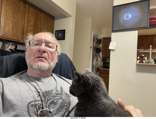 Adam with my cat Devin on my lap