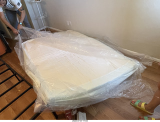 home construction - mattress coming out of the box