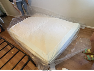 209 a1h. home construction - mattress coming out of the box