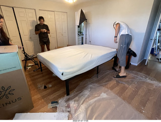 home construction - mattress coming out of the box + Anthony + Dima