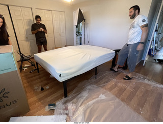 home construction - mattress coming out of the box + Anthony + Dima