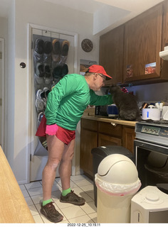 Adam dressed for bicycling in red and green for Christmas