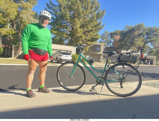 Adam dressed for bicycling in red and green for Christmas