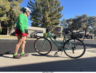 Adam dressed for biking in red-green Christmas colors