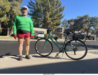 Adam dressed for biking in red-green Christmas colors