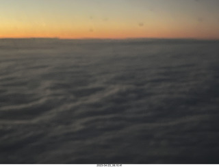 13 a1s. airline aerial sunrise over the ocean