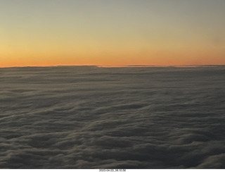 airline aerial sunrise over the ocean