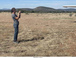 cat Pickle drinking from the faucet