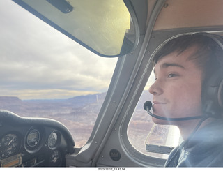 147 a20. Tyler flying N8377W without sunglasses