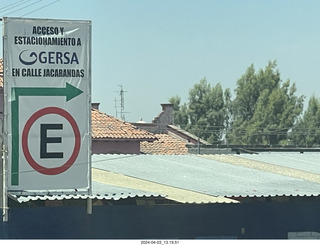 38 a24. parking sign at jackarandas