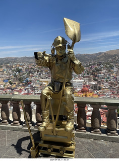 106 a24. Guanajuato - city view plaza with gold man
