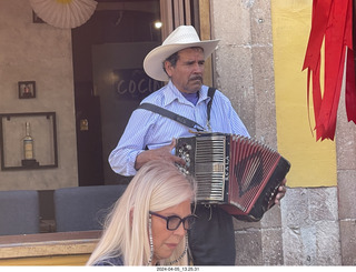 169 a24. Guanajuato - restaurant musician with accordian