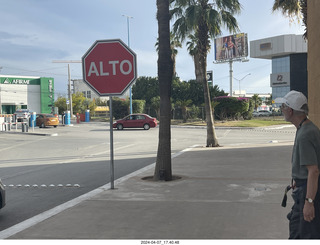 STOP sign says ALTO