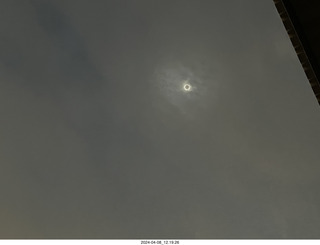 Torreon eclipse day - partial eclipse through clouds, attempt by iPhone