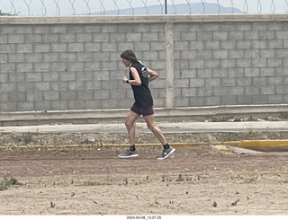90 a24. Torreon eclipse day - Gwyneth Hueter running again